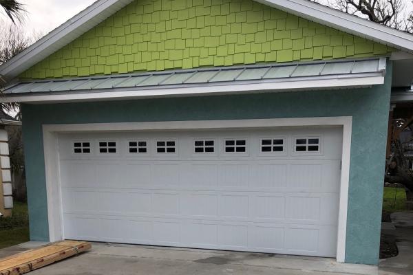 Carriage Stamp Garage Door with Stockton Glass Top Section
