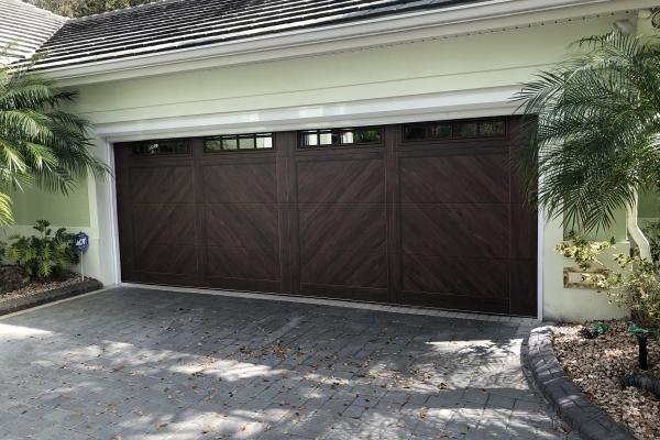 Accents Woodtones Flush Carriage House Garage Door with Madison Glass Top Section