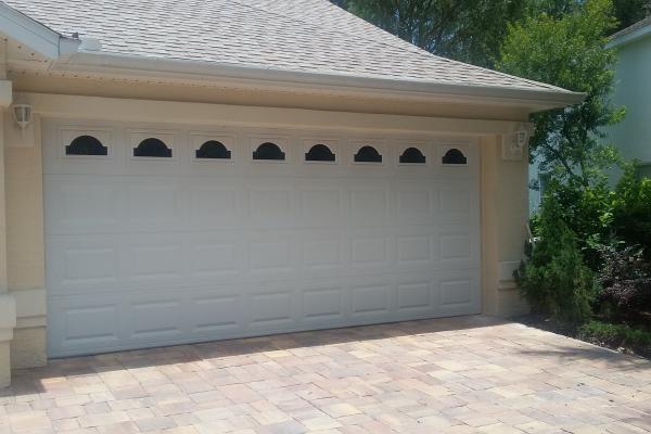 Raised Short Panel Garage Door with Cathedral Glass Top Section