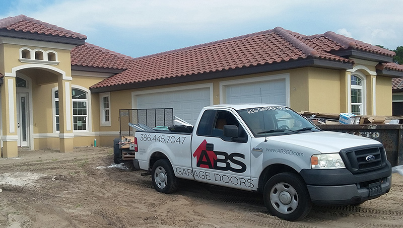 Garage Door Services Truck Parked Near Home