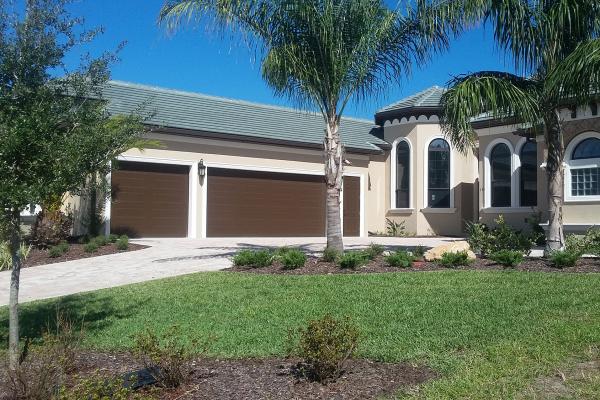 two garage doors on a house