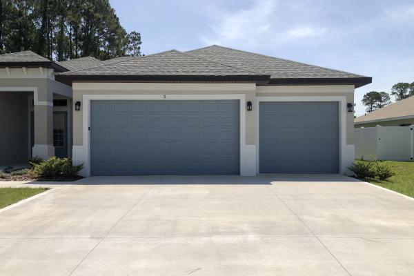 Raised Short Panel Garage Doors in Custom Color.