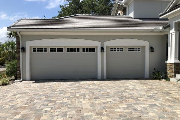Carriage Stamp Long Panel Garage Doors with Glass Top Section Stockton Inserts.
