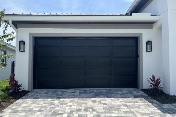 New construction home with a Raynor Buildmark Raised Ranch garage door installed.