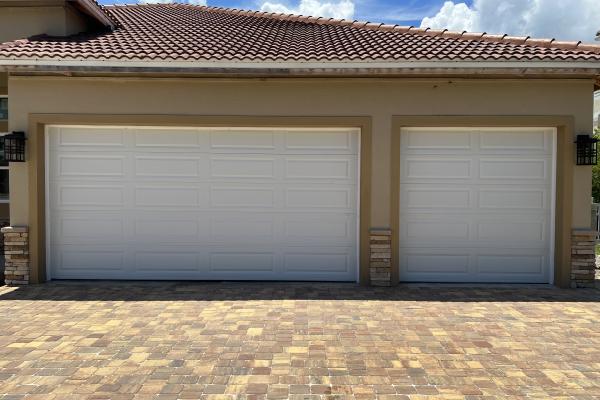 New construction home with simple clean lines of CHI Raised Long Panel Garage Doors