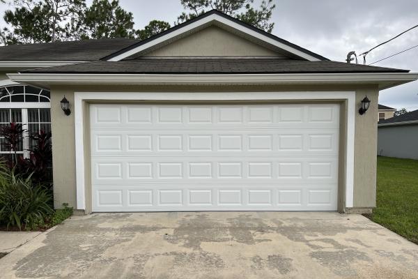 Replaced an existing garage door with similar model to help freshen up the exterior of the house. 