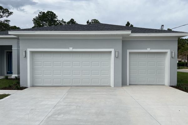 CHI model 2250 garage doors installed by ABS Garage Doors in Palm Coast, Florida