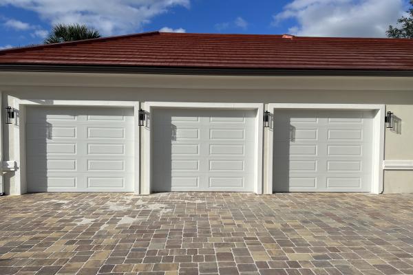 New construction with home with Raised Long Panel Garage Doors.