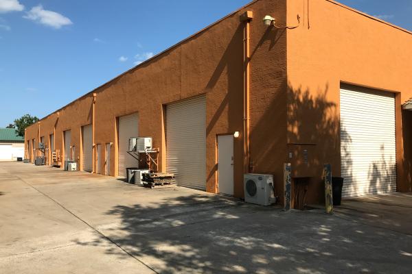 Several rolling services doors installed at a warehouse in Palm Coast, FL.