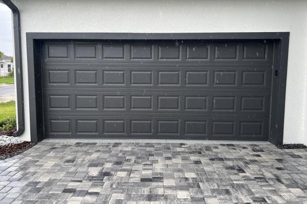 CHI model 2250 garage door installed by ABS Garage Doors In Palm Coast, Florida.