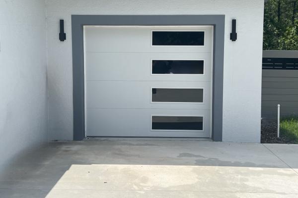 CHI model 2127 garage door installed by ABS Garage Doors in Palm Coast, Florida
