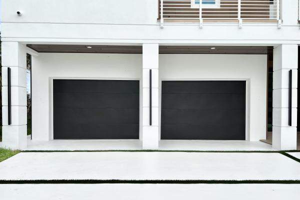 Recently built home with two Flush style garage doors in custom color.