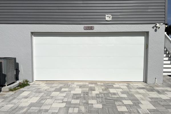 CHI Model 2151 Flush Garage Door Installed by ABS Garage Doors in Flagler Beach, Florida