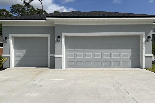 CHI model 2250 garage doors installed by ABS Garage Doors In Palm Coast, Florida