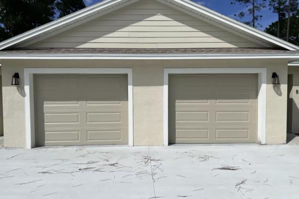 CHI model 4250 garage doors installed by ABS Garage Doors in Palm Coast, Florida.