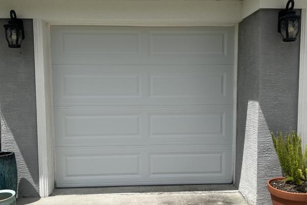 CHI model 4250 garage door installed by ABS Garage Doors in Palm Coast, Florida.
