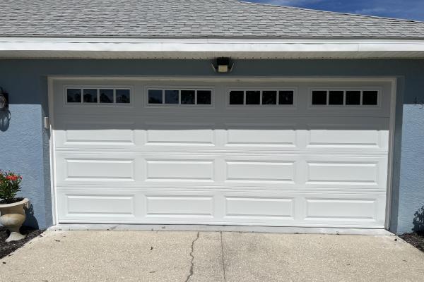 CHI model 4250 garage door installed by ABS Garage Doors in Palm Coast, Florida