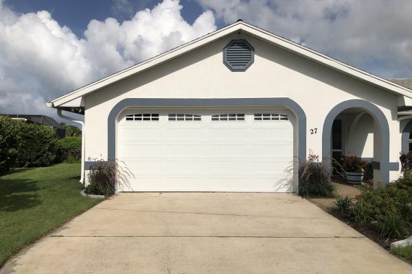 Carriage Stamp Long Panel Garage Door with Arched Stockton Glass Top Section