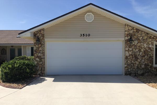 Insulated Garage Door with Flush Panel Design