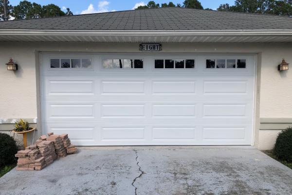 Customer wanted to update the look of the garage door to match the house.