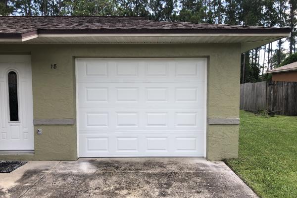 Customers garage door was damaged from the last hurricane and they wanted to upgrade to a new hurricane rated garage door. 