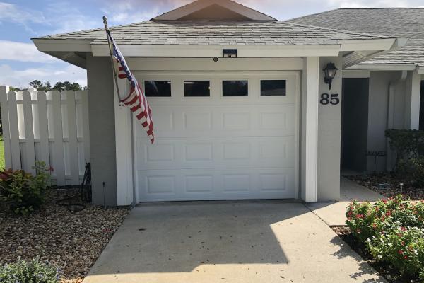 Raised Panel Garage Door with Plain Glass Top Section