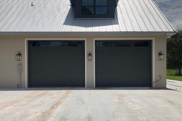 These doors were selected by the customer to go with their new home. Doors were painted in dark brown color.