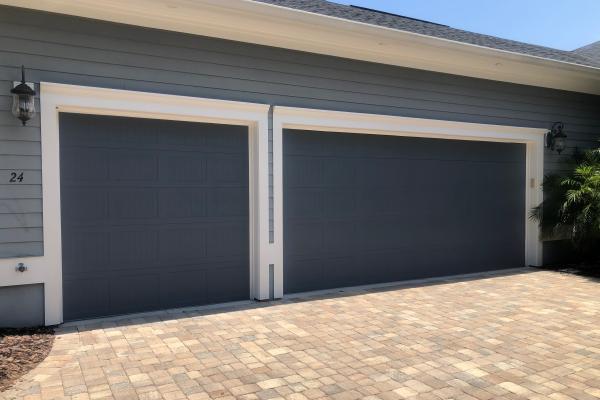 Carriage Stamp Short Panel Garage Door with Custom Color Selected by the Homeowner.