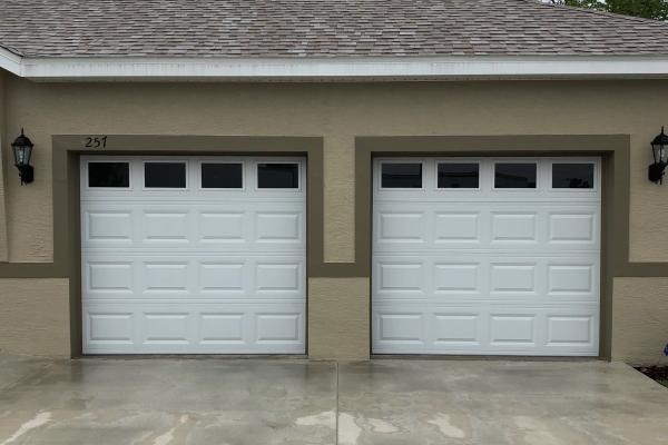 Customer wanted a garage door with a simple clean look that would go with a house with similar characteristics.
