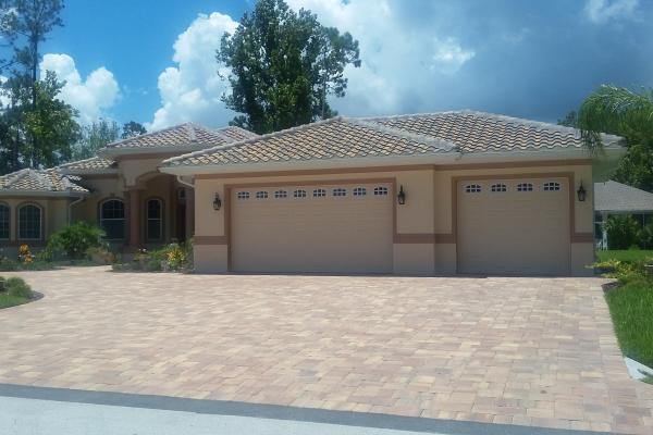 Raised Short Panel Garage Doors with Cascade Glass
