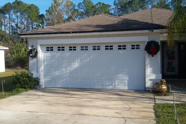 Raised Short Panel Garage Door with Glass Top Section Stockton Design