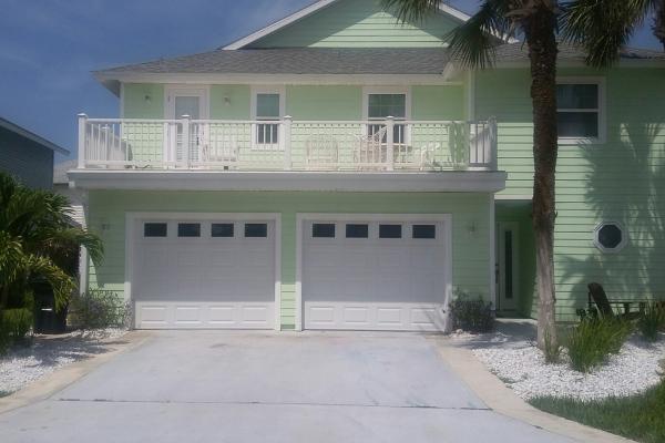 Raised Short Panel Garage Door With Plain Glass