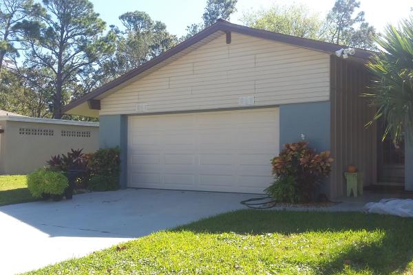 Raised Long Panel Garage Door in Almond