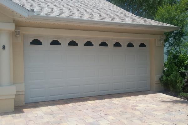 Raised Short Panel Garage Door with Cathedral Glass Top Section