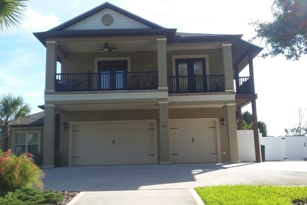 Carriage Stamp Long Panel Garage Door with Spade Hardware 