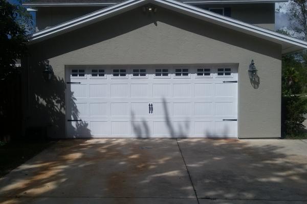 Carriage Stamp Short Panel Garage Door with Stockton Glass Top Section and Spade Hardware