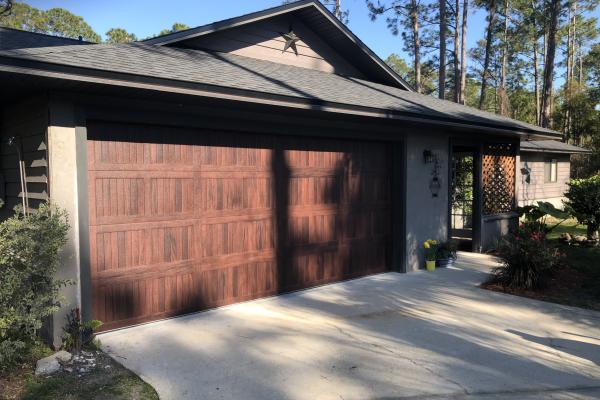 Accents Carriage Stamp Short Panel Garage Door in Mahogany