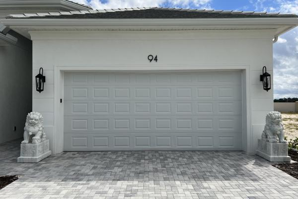 CHI model 2250 - 2251 raised short panel garage door installed by ABS Garage Doors Palm Coast, Florida