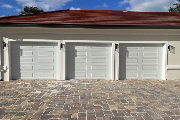 CHI Model 4250 Raised Long Panel Garage Doors Installed by ABS Garage Doors Palm Coast, Florida.