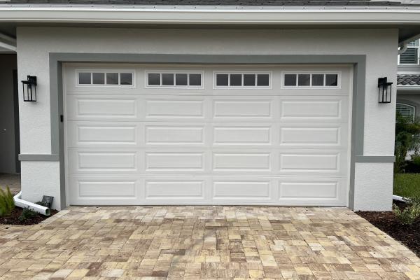 CHI 4250 with Madison Glass Top Section Installed by ABS Garage Doors in Palm Coast, Florida