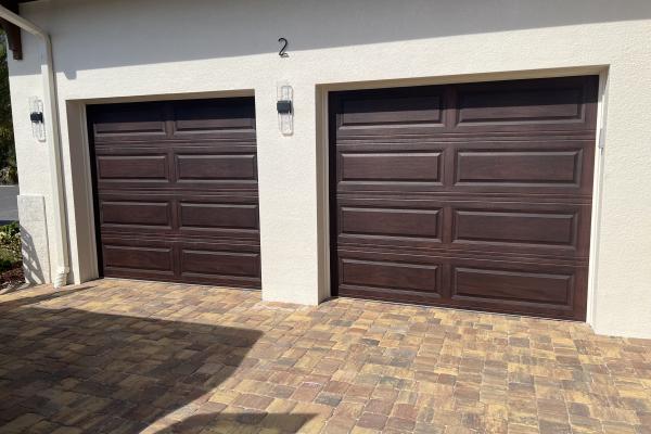 Chi Model 4283 Accents in Mahogany installed by ABS Garage Doors in Flagler Beach, Florida