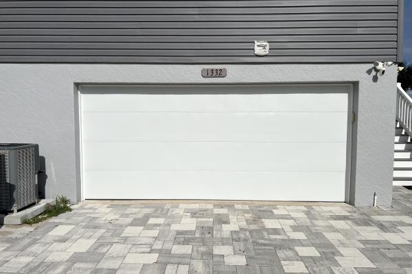 CHI Model 2151 Flush Garage Door Installed by ABS Garage Doors in Flagler Beach, Florida