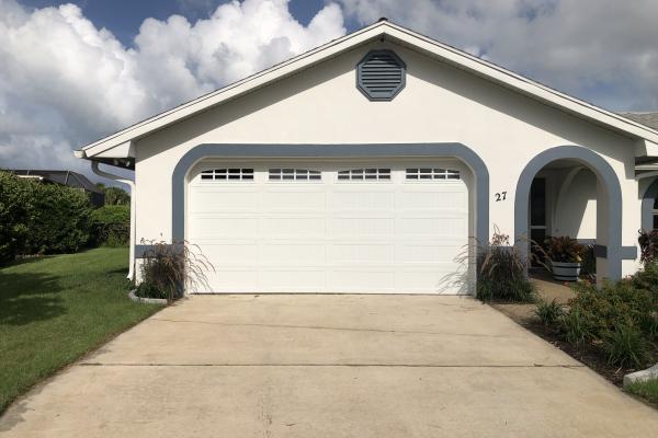 Carriage Stamp Long Panel Garage Door with Arched Stockton Glass Top Section
